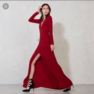 Red Reformation dress with slit leg.